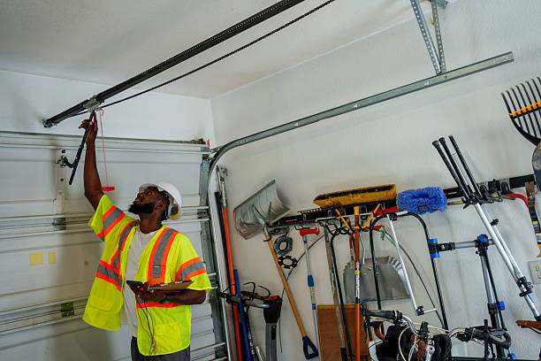 Professional Garage Door Panel Replacement technician working in East Uniontown, PA